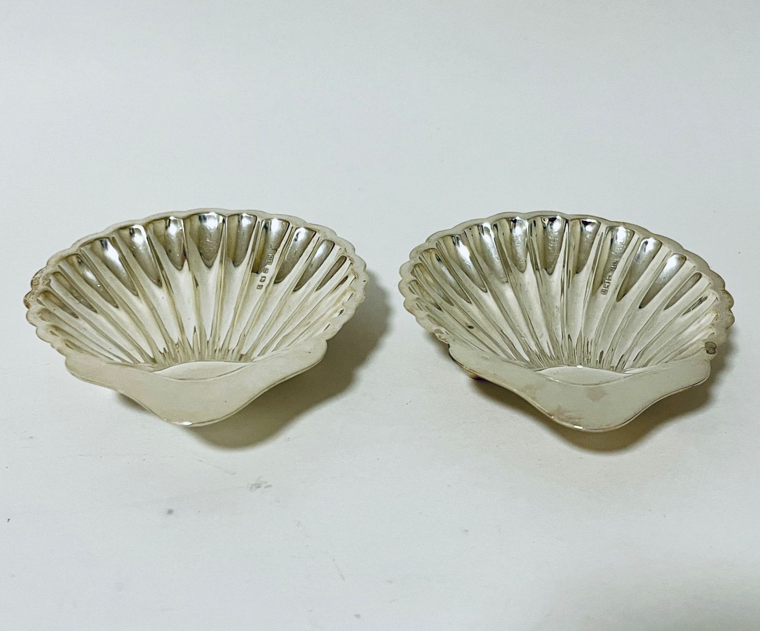 Pair of Antique Silver Shell Shaped Butter Dishes