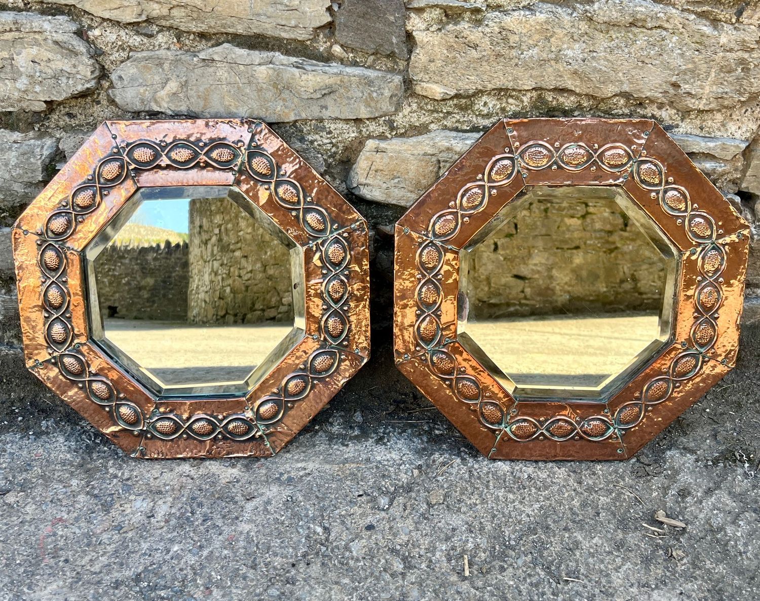 Pair of Arts and Crafts Octagonal Copper Mirrors