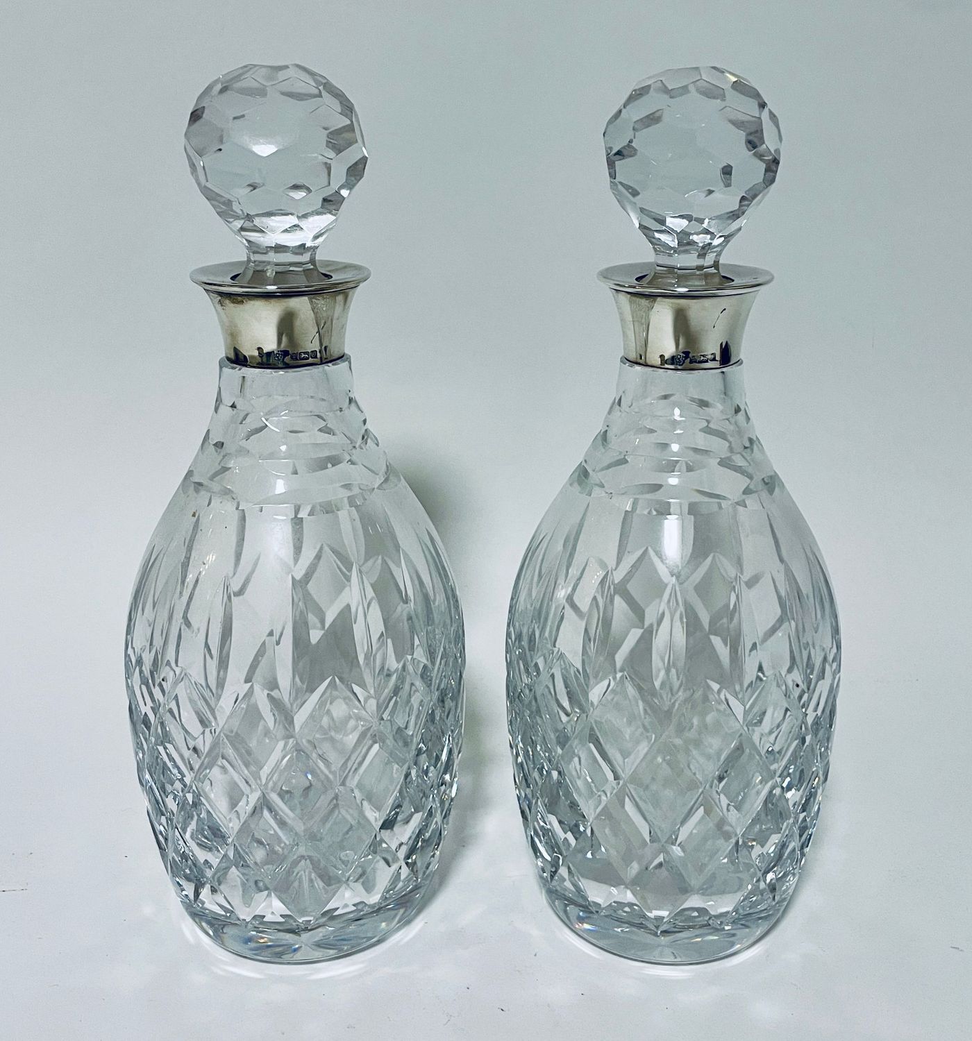 Pair of Silver Collar Decanters