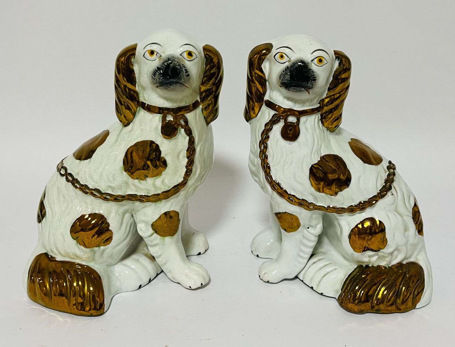Pair Victorian Copper Lustre Staffordshire Dogs