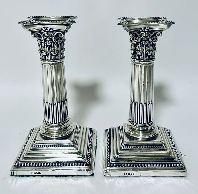 Pair of Antique Corinthian Column Silver Candlesticks
