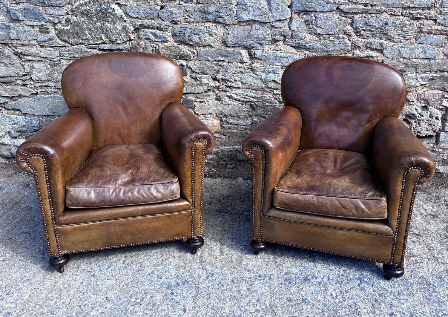 Pair of Antique Leather Club Chairs