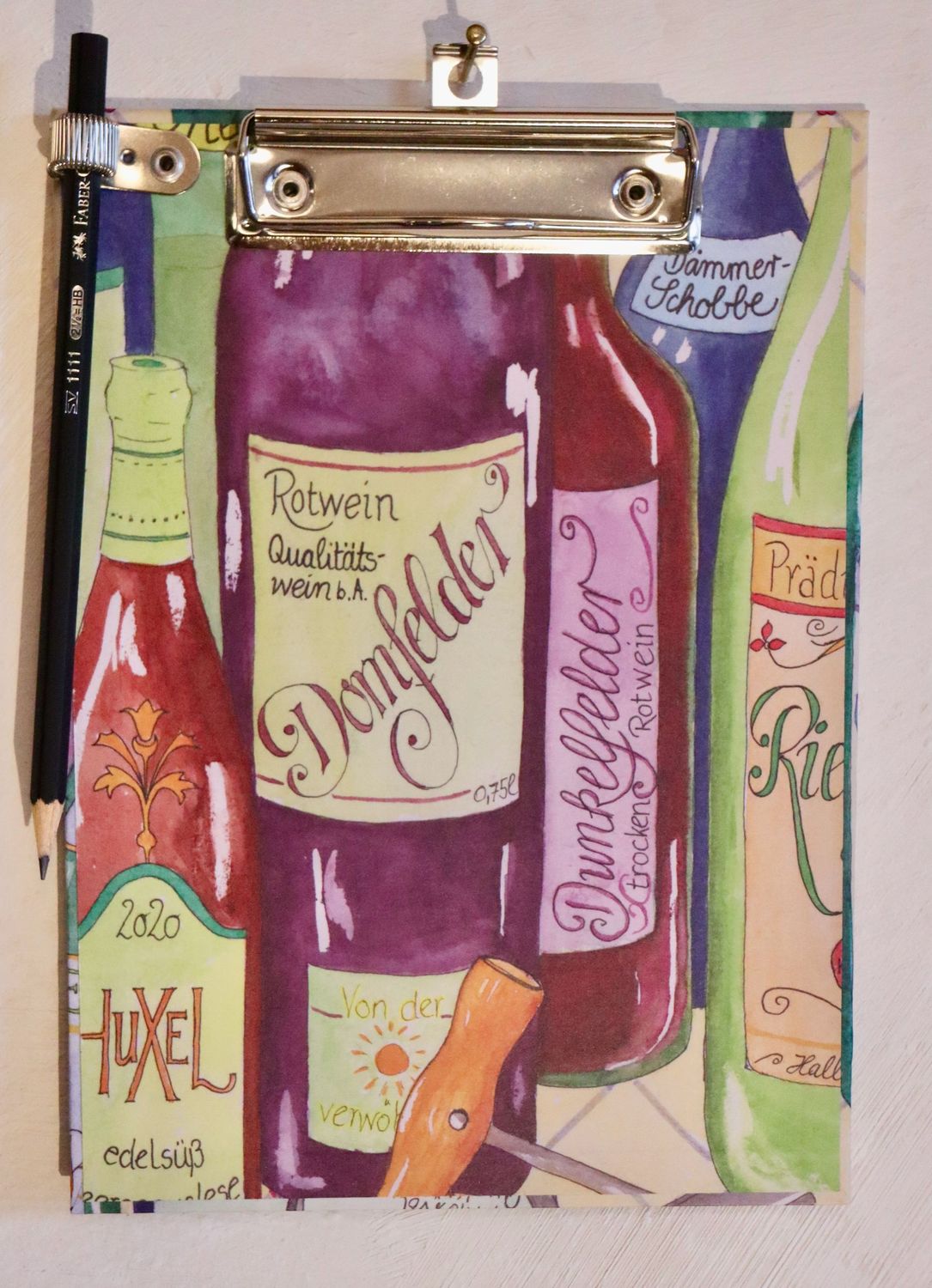 Klemmbrett A5 zum Aufhängen mit Flaschebabier Klemmbrett A5 zum Aufhängen mit Flaschebabier