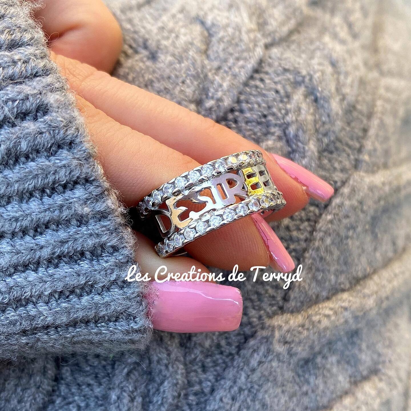 Anello binario con zirconi