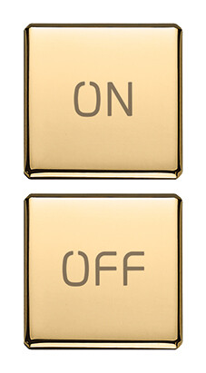 Две плоские клавиши, символы "ON/OFF", золото