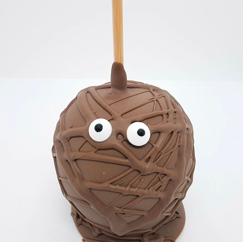 Milk chocolate and Caramel Mummy (available October 24th-31st) Milk chocolate and Caramel Mummy (available October 24th-31st)