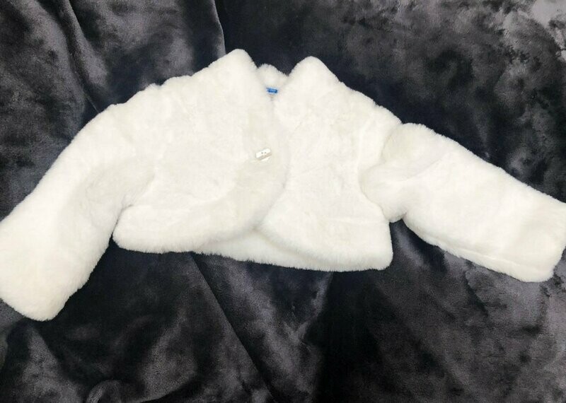 Veste courte en fourrure blanche