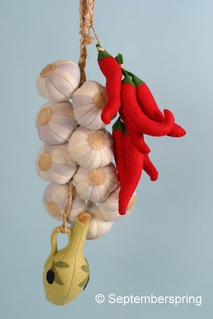Patroonblad Knoflookstreng met pepers en olievaatje