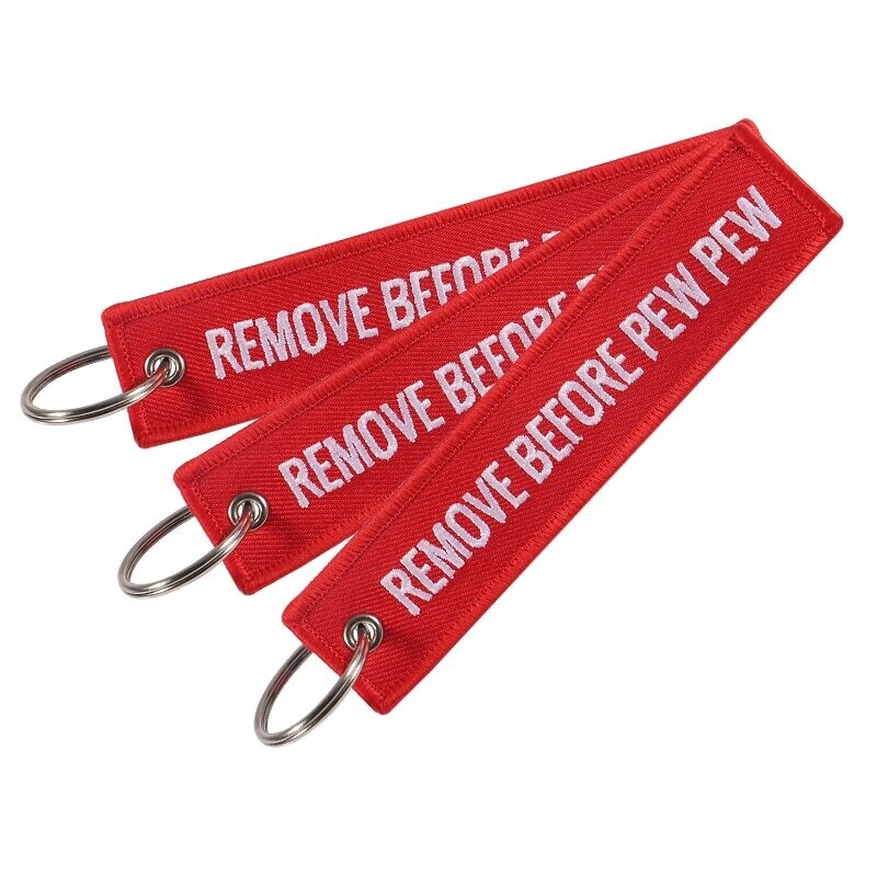 Remove before Pwe Pew Schlüsselanhänger