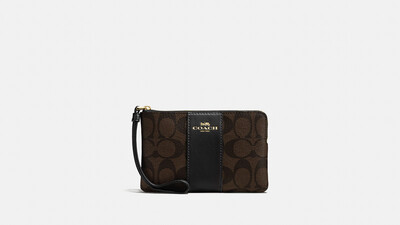 COACH Corner Zip Wristlet In Signature Canvas