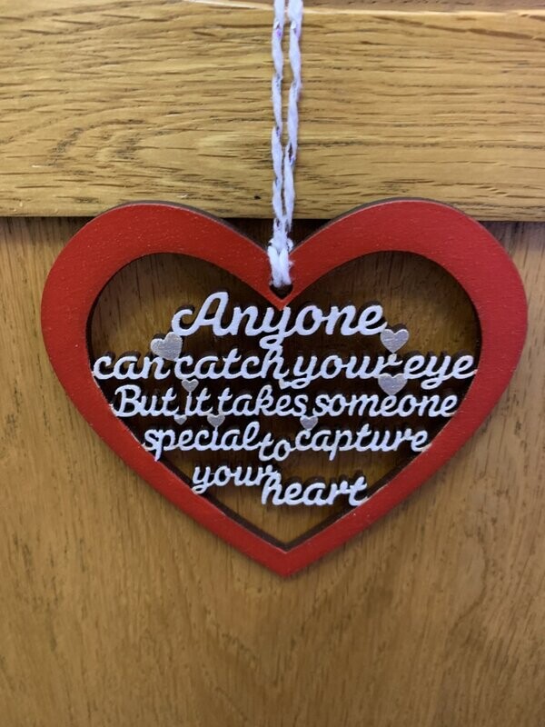 Anyone can catch your eye hanging heart quote