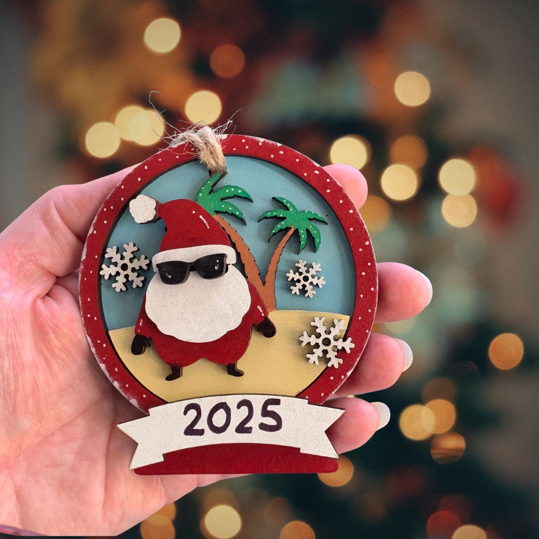 Hand-painted Limited Edition 2025 Christmas Decoration – Summery Santa on the Beach Hand-painted Limited Edition 2025 Christmas Decoration – Summery Santa on the Beach