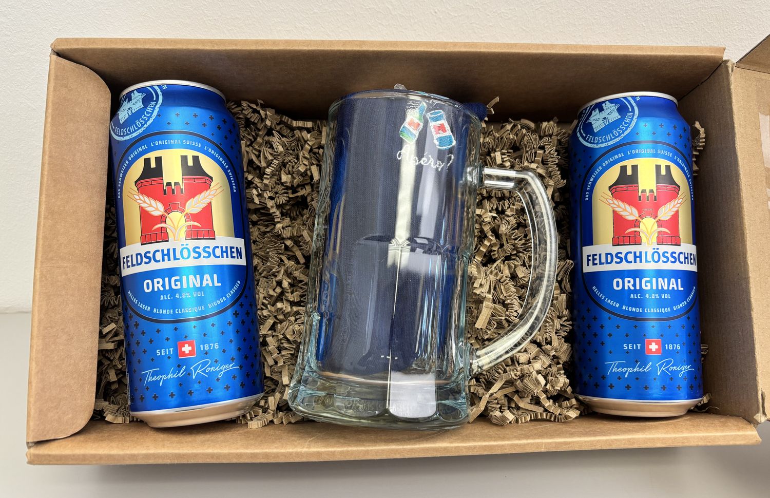 Feldschlösschen Geschenkset - Bier und Socken Feldschlösschen Geschenkset - Bier und Socken