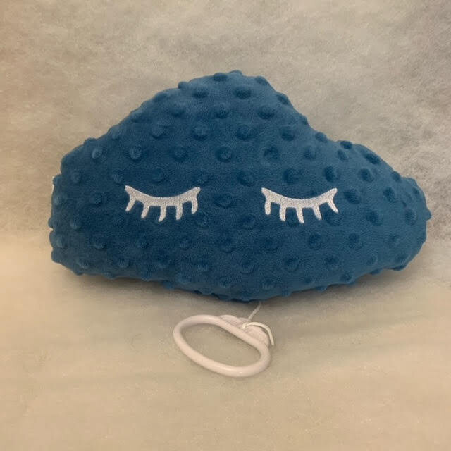 Coussin musical bleu pétrole