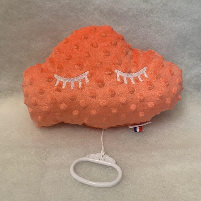 Coussin musical corail