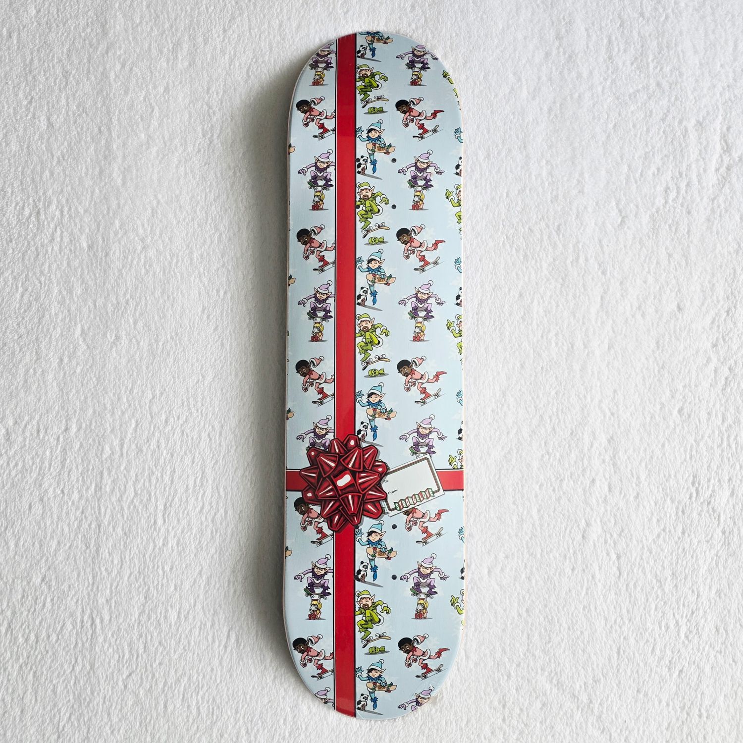 Strangelove Skateboards Elves Holiday Gift Wrap Deck 8
