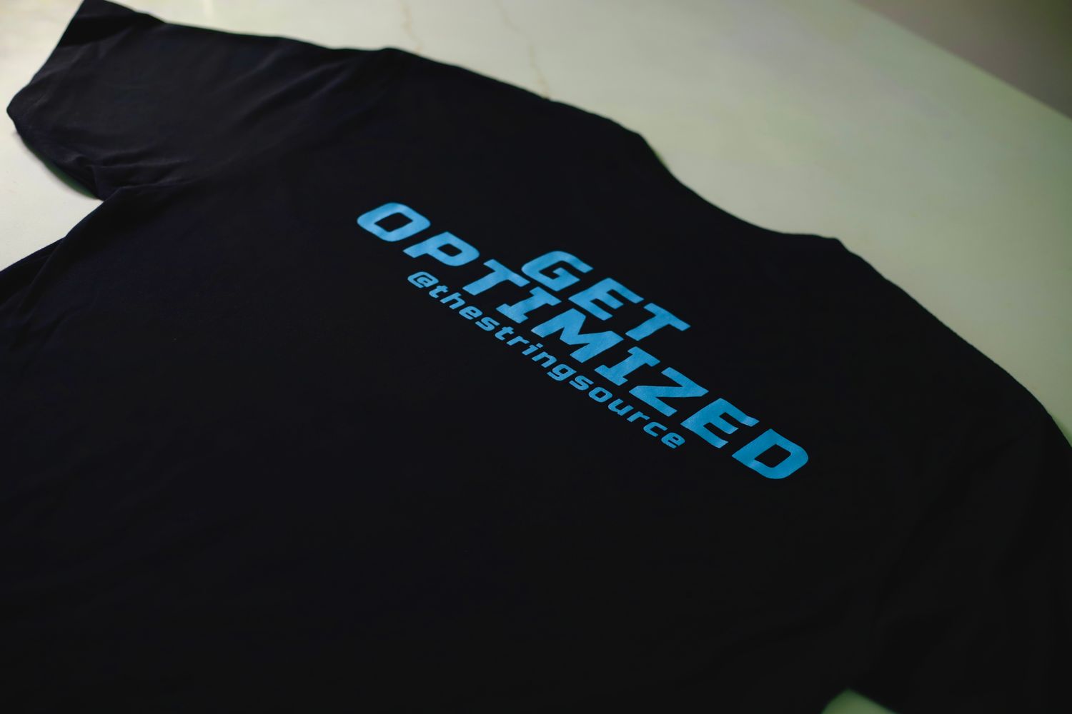 The Source &quot;GET OPTIMIZED&quot; T Shirts!