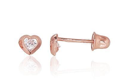 Gold earrings are pierced with a screw. Heart