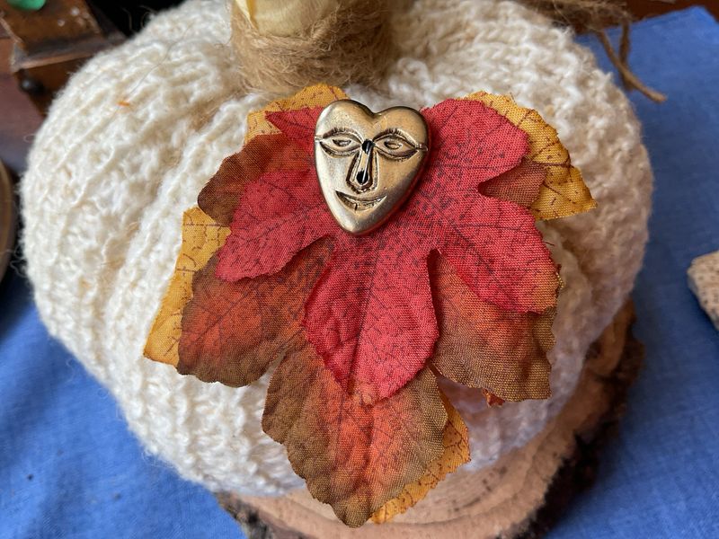 Heart Wisdom Fall Pin – Gold-Tone Engraved Face on Autumn Leaves
