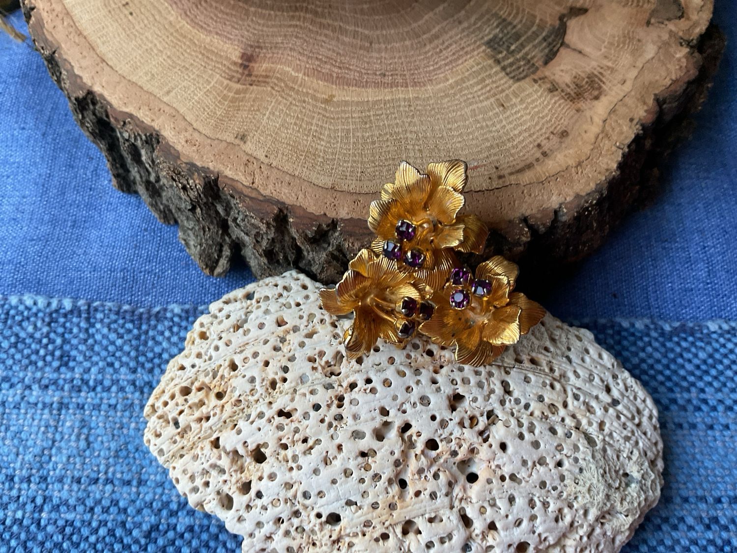 Gold Tone Flower Brooch with Purple Stones