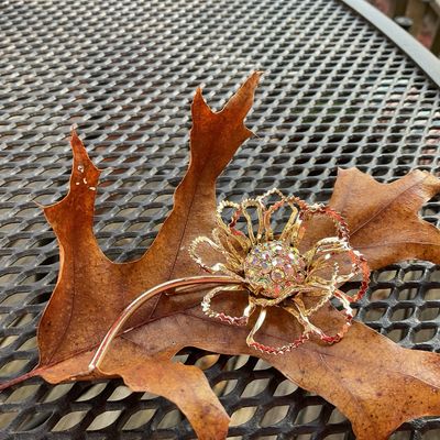 Golden Bloom – Sarah Coventry Vintage Floral Brooch with Rhinestone Center