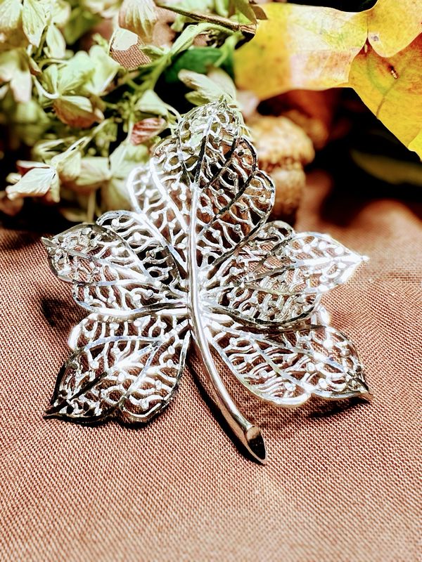 LIFTED LEAF — Signed Silver-Tone Vintage Brooch with Veined Cutouts