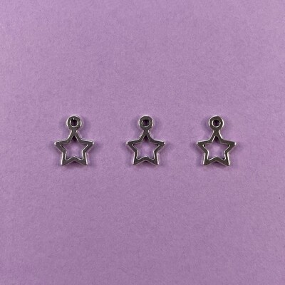 Dije de Metal Plateado Estrella Calada Lisa 14 x 10 x 1.5 mm