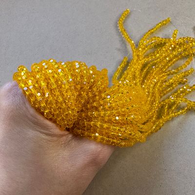 Cristal Redondo Facetado Transparente 4 mm Amarillo