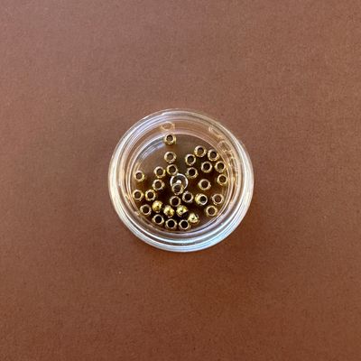 Separador de Acero Quirúrgico Redondo Dorado Bañado 18 K. 3 x 2 mm