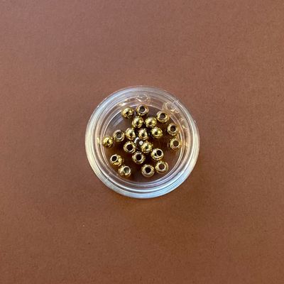 Separador de Acero Quirúrgico Redondo Dorado Bañado 18 K. 4 x 3 mm
