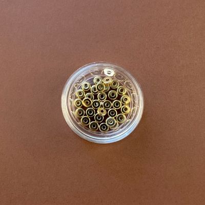 Separador de Acero Quirúrgico Disco Dorado Bañado 18 K. 4 X 1.2 mm
