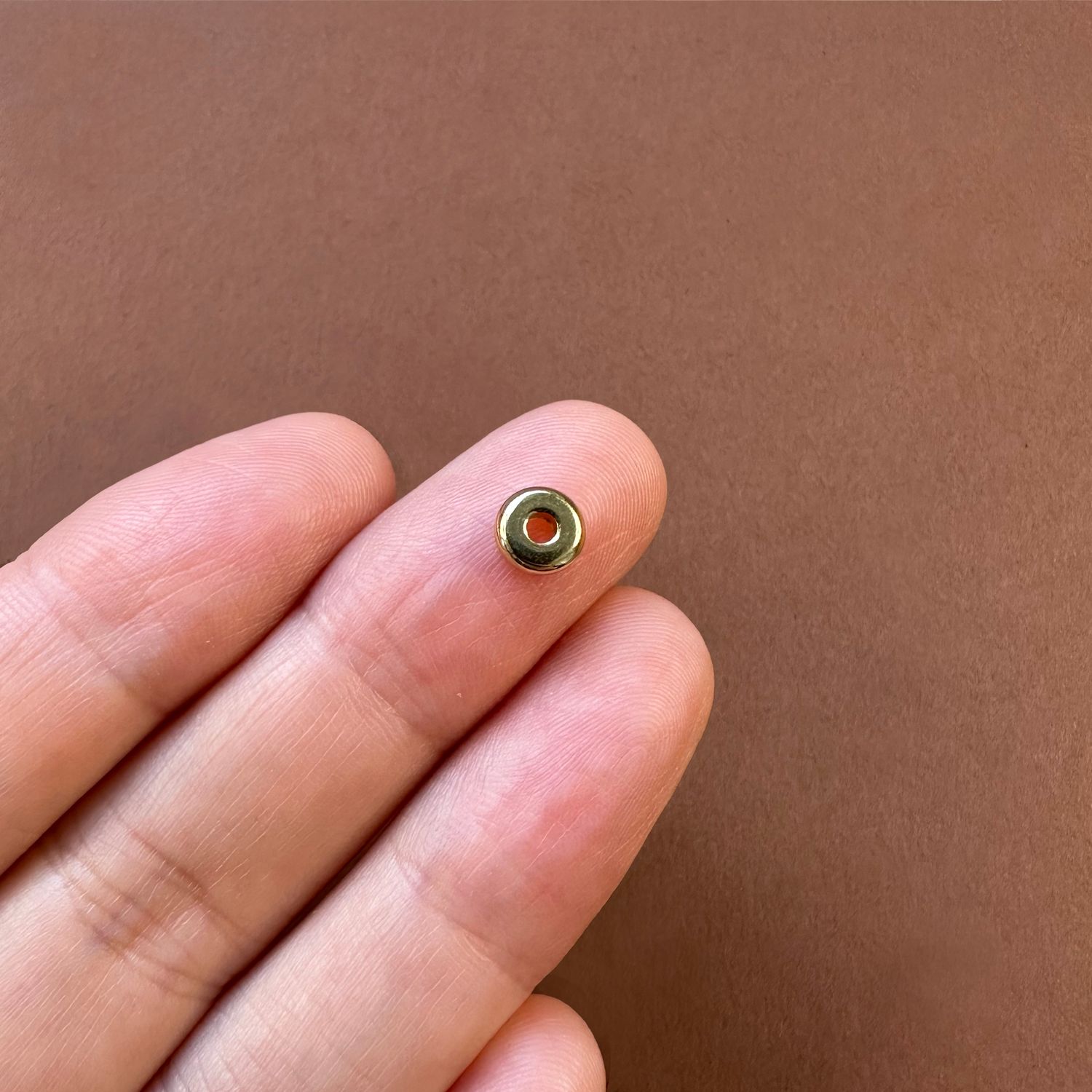 Separador de Acero Quirúrgico Disco Dorado Bañado 18 K. 6 x 2 mm