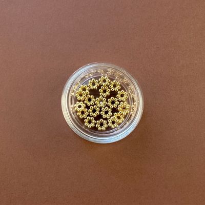 Separador de Acero Quirúrgico Snowflake Flor Dorado Bañado 18 K. 5 x 1.3 mm
