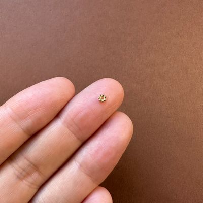 Separador de Acero Quirúrgico Snowflake Flor Dorado Bañado 18 K. 3 x 1 mm