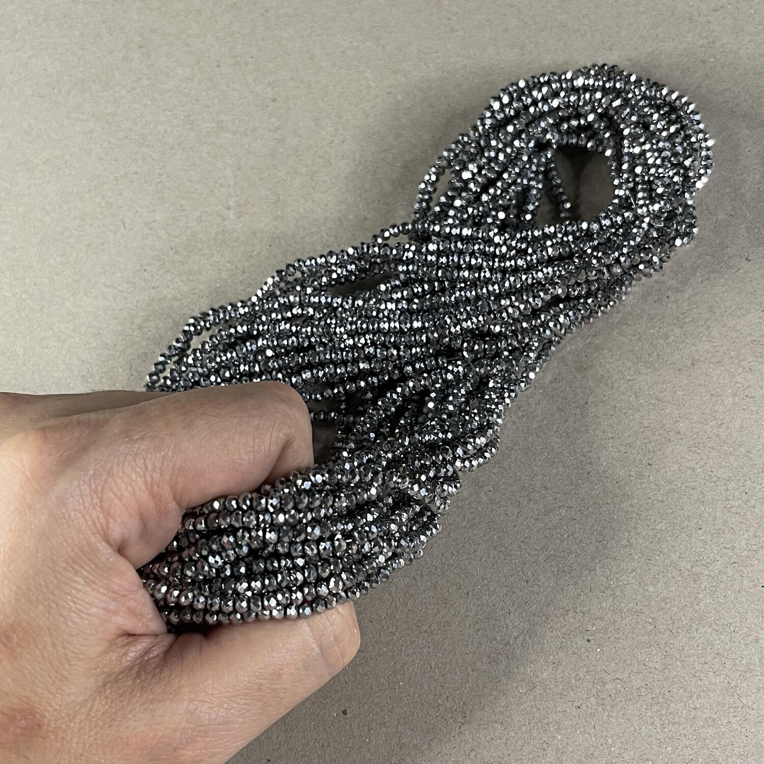 Cristal Dona Facetada Metalizada 3 x 2.5 mm Plateado