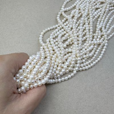 Piedra Natural Perla de Río Oval Papa 4 - 5 mm Blanca