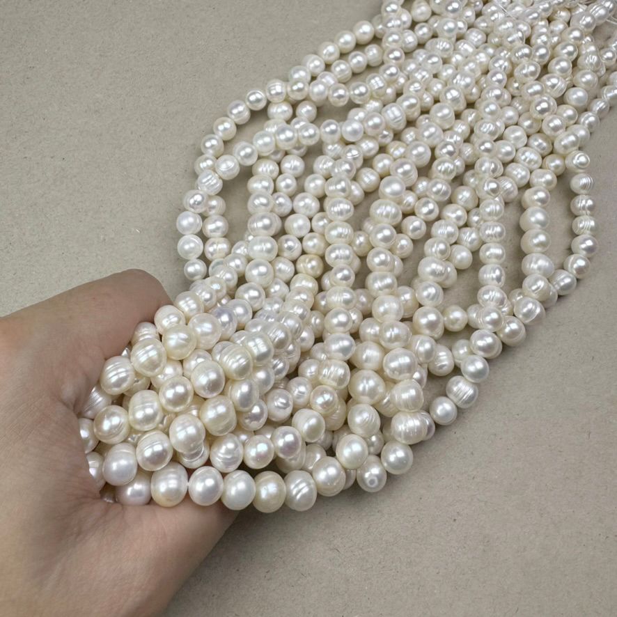 Piedra Natural Perla de Río Oval Papa 7 - 8 mm Blanca