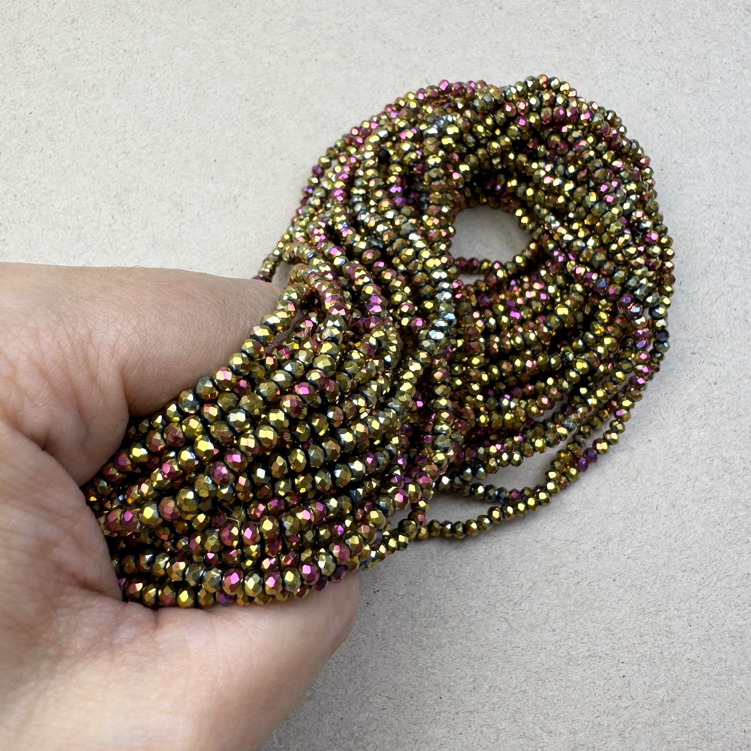 Cristal Dona Facetada Metalizada Iris Rosa 3 x 2.5 mm Dorado