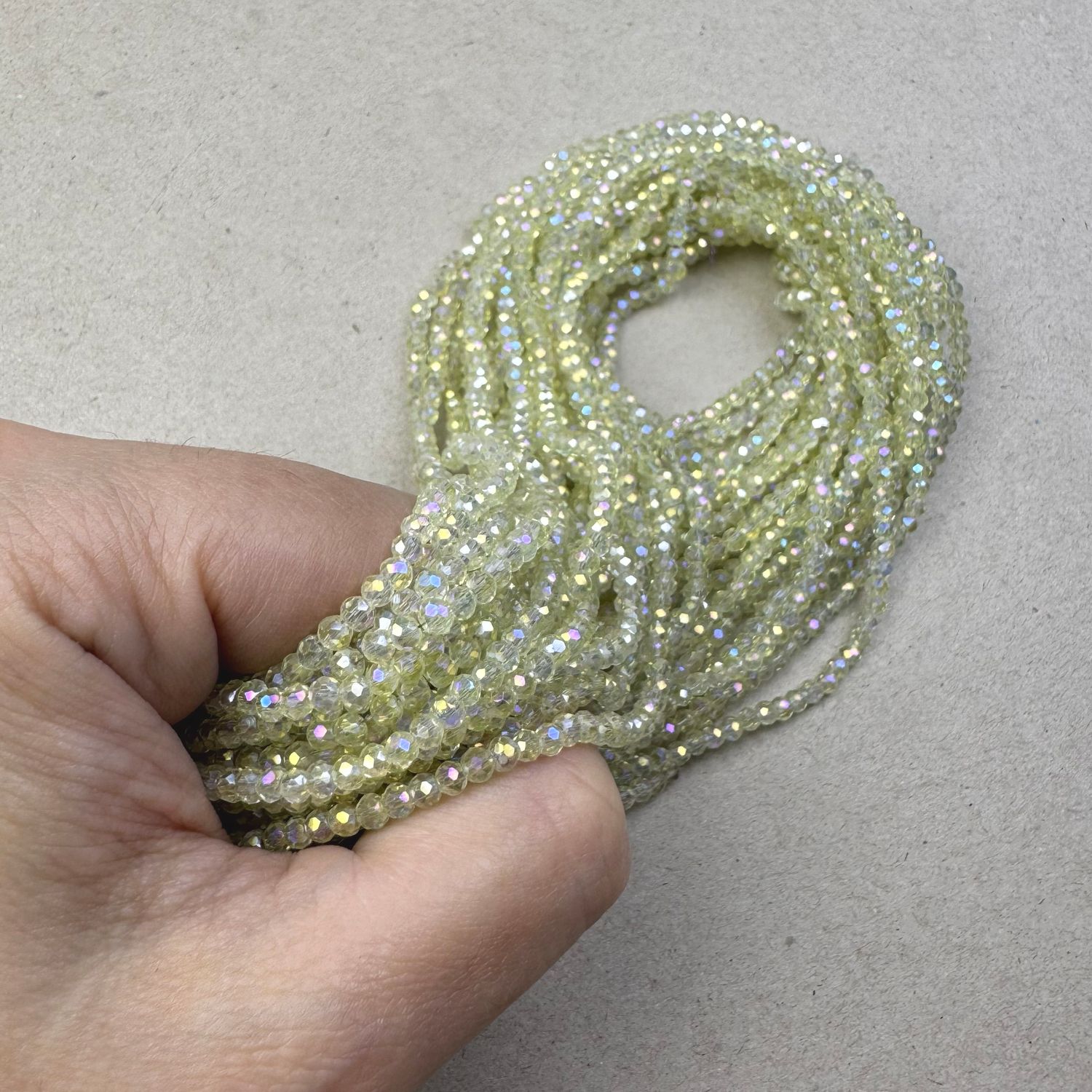 Cristal Dona Facetada Transparente AB (Tornasol) 3 x 2.5 mm Champagne Lemon