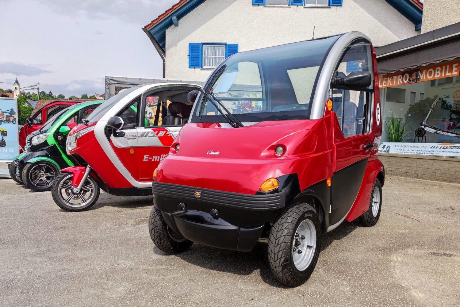 Elektromobil CHARLY gebraucht - rot - 15 km/h - E- Kabinenroller, Krankenfahrstuhl, Seniorenmobil - ohne Führerschein fahren erlaubt