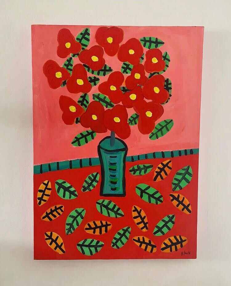 Vaso de flores vermelhas