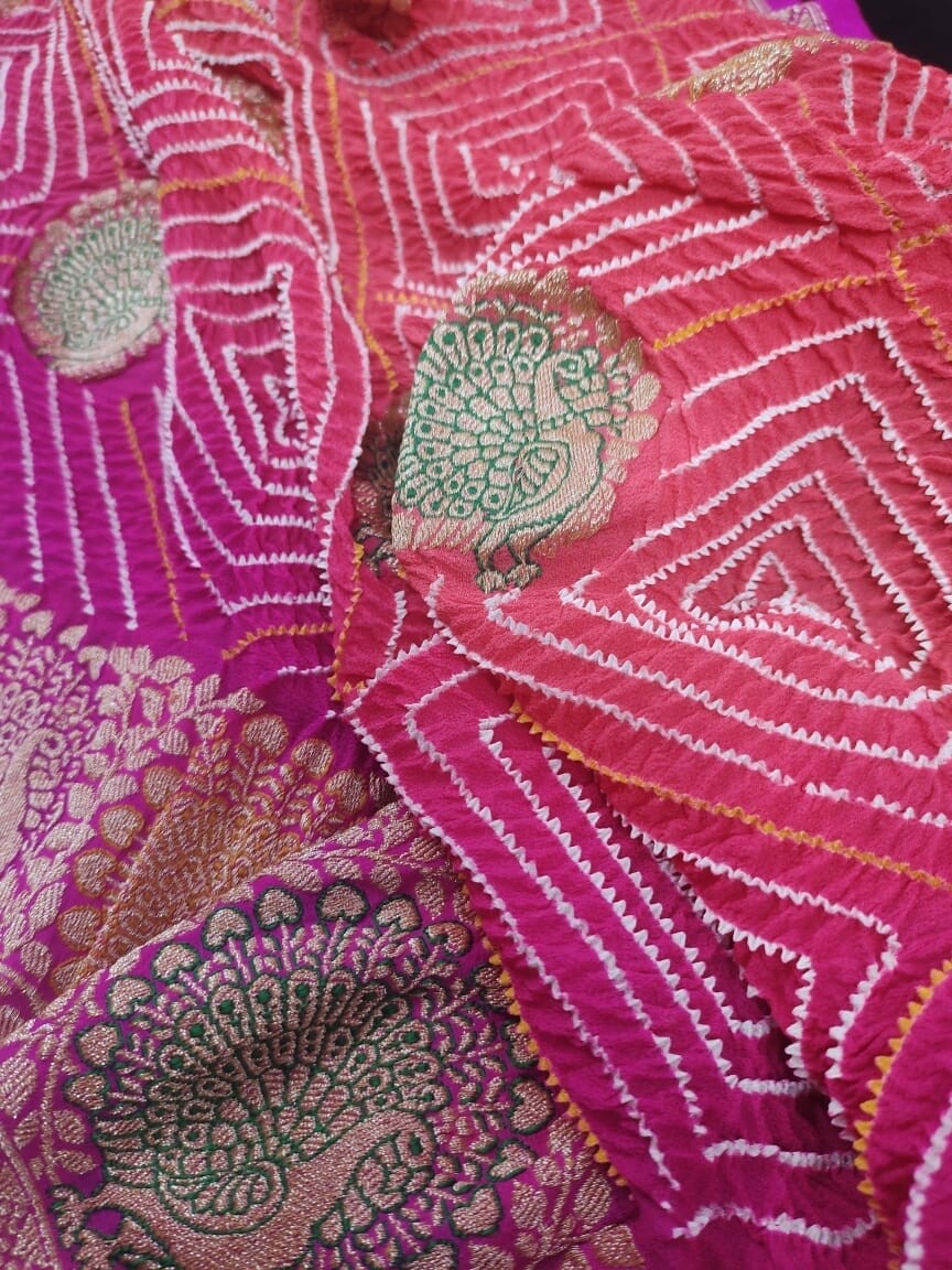 peach and pink Banarasi border bandhej saree