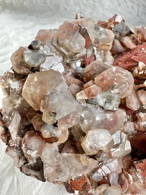 Diamond Space Station: Leticular Calcite on Red Hematite