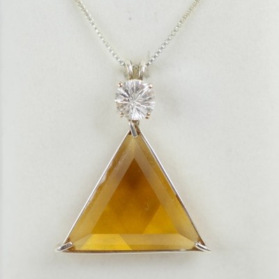Siberian Gold Vogel with White Topaz Siberian Gold Vogel with White Topaz