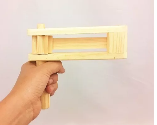Matraca de madera