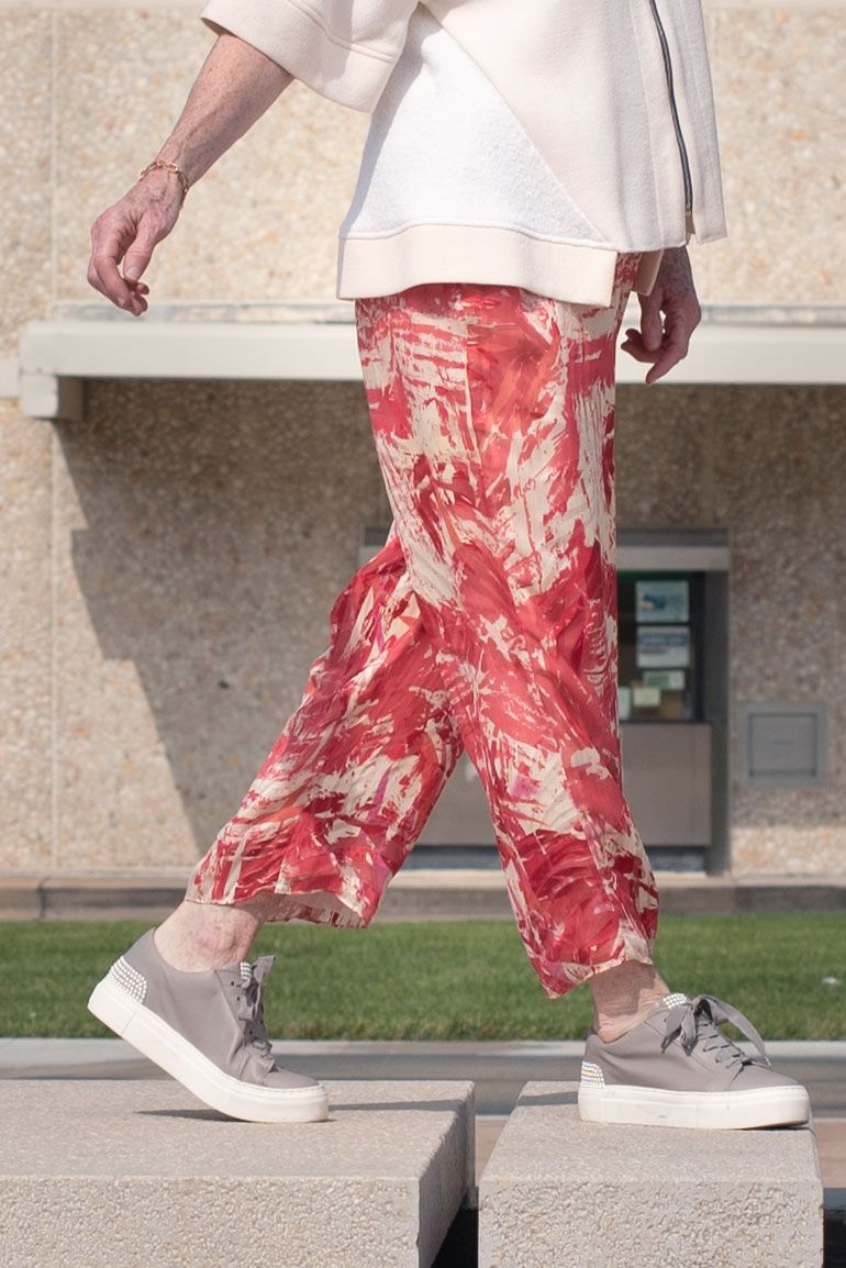 The Chesney Pants made in red print silk fabric. 