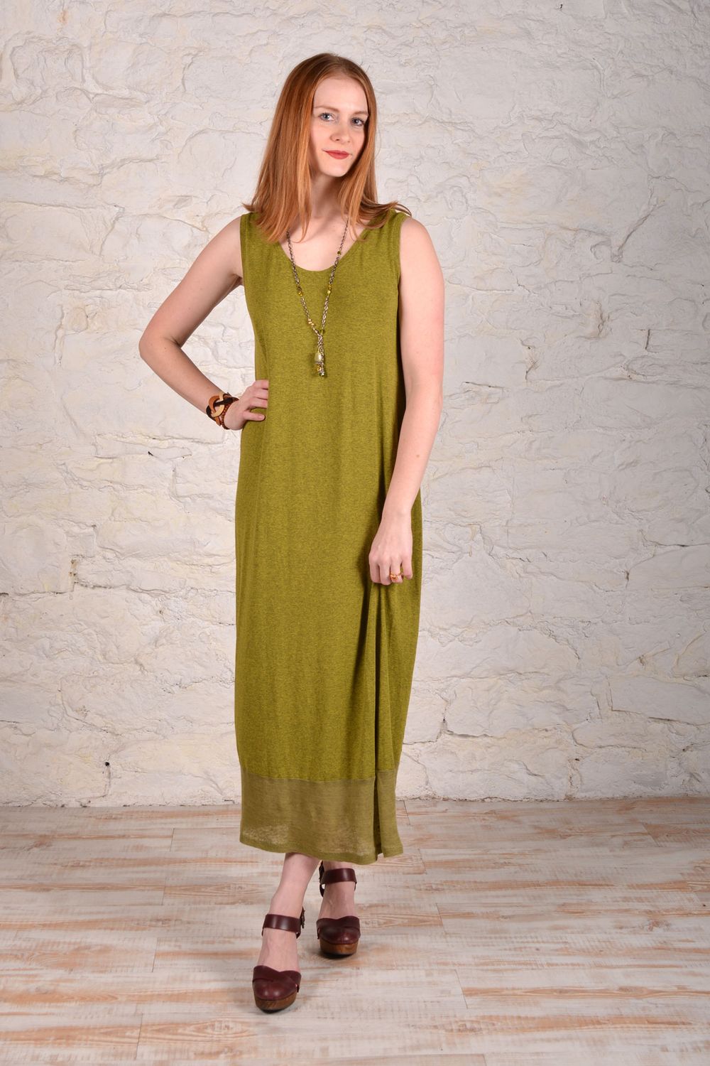 The eDress made in green jersey knit with a gauze panel at the bottom. 
