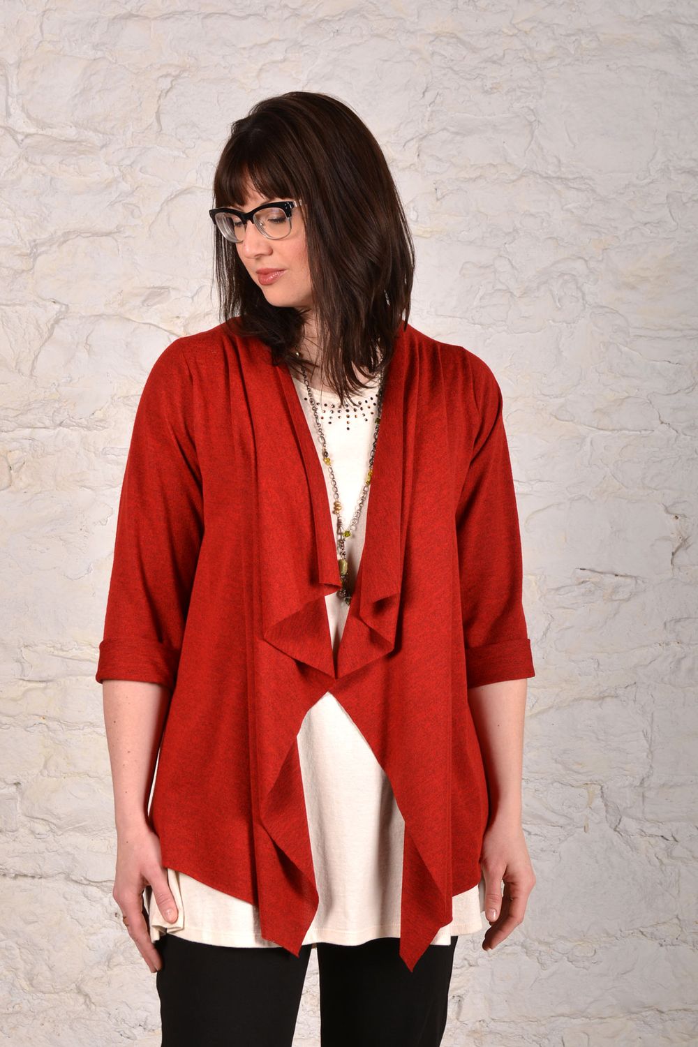 The eShrug made in a red jersey knit fabric. 