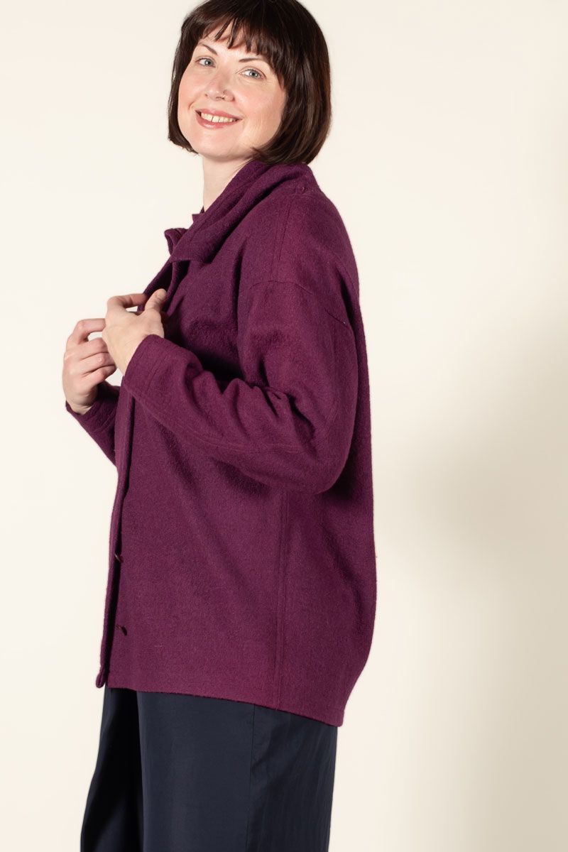 Side view of the Fuji Mt. Top made in grape wool boucle fabric. Side view of the Fuji Mt. Top made in grape wool boucle fabric.