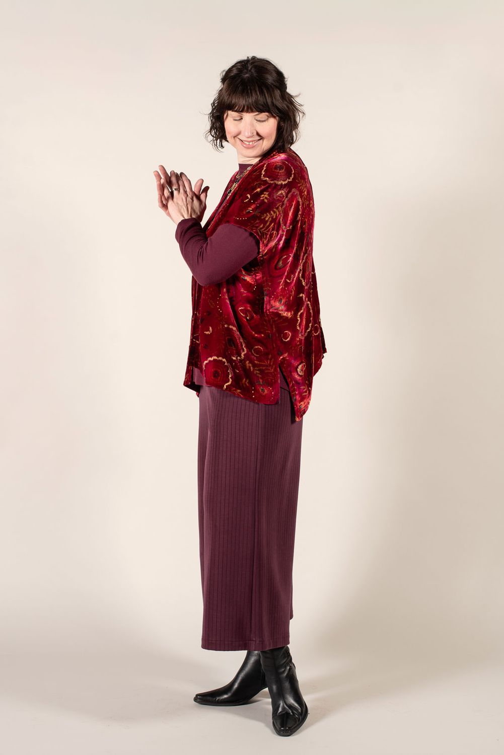 Side view of the Three Fold Vest made in velvet, paired with the West End Pants.